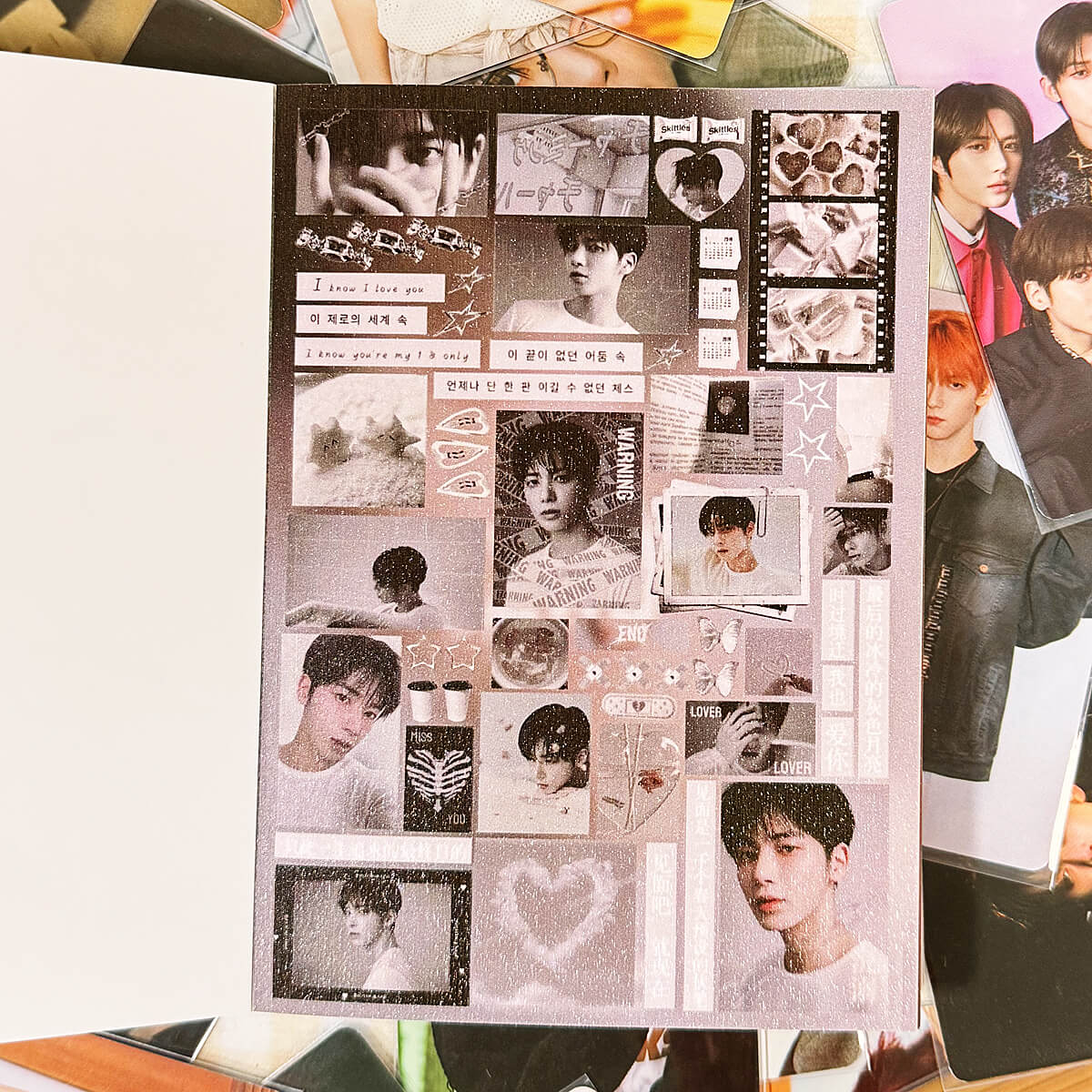 Close-up of photobooth-style TXT member stickers with glossy finish and kiss-cut edges